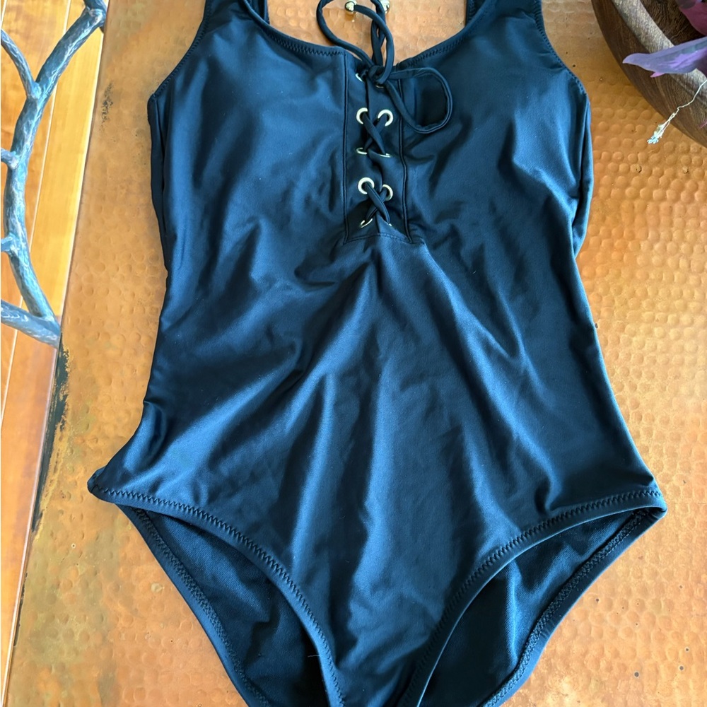 Mossimo Supply Co. Black lace up swimsuit one piece. Very good condition.